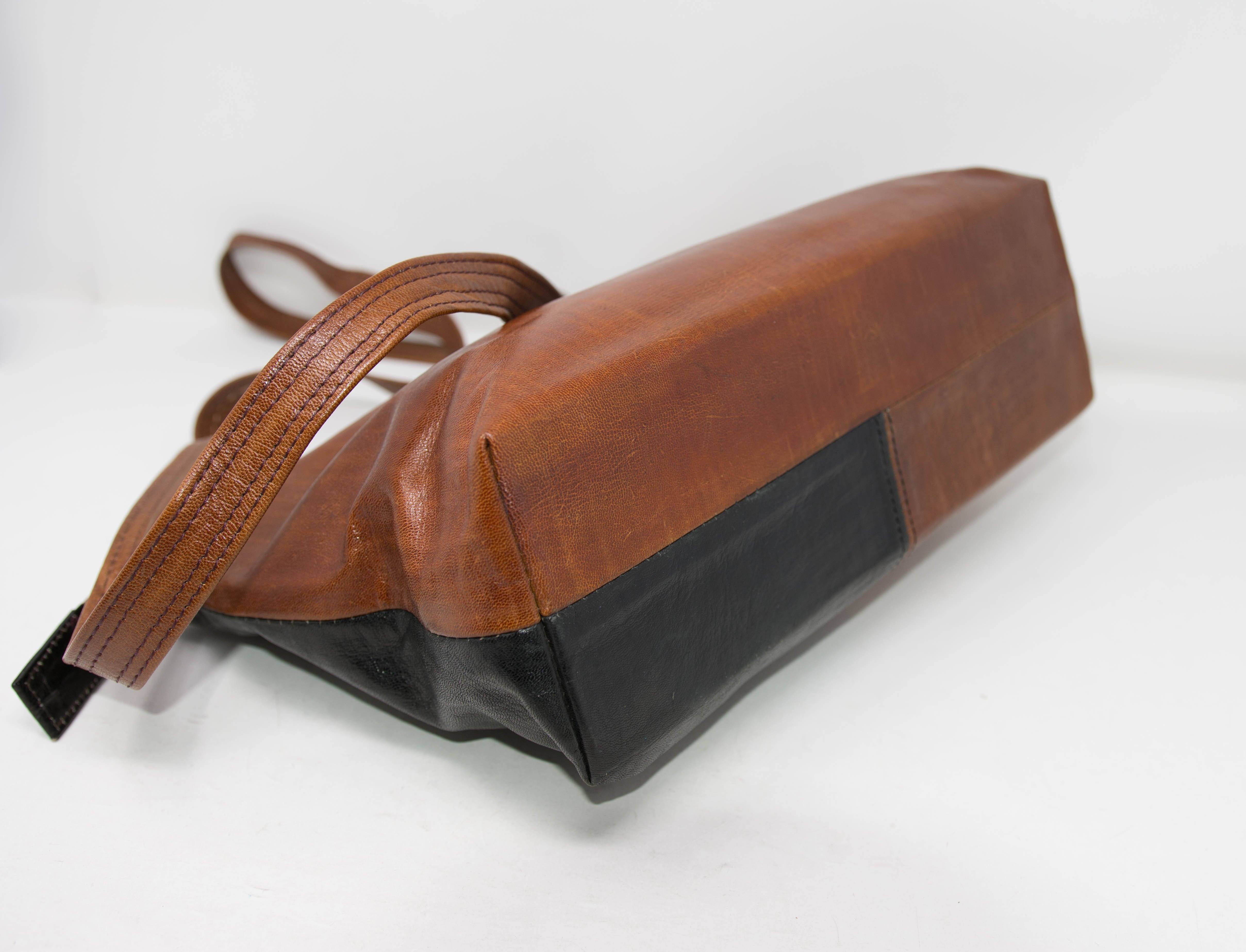 Leather pouch with brown kente